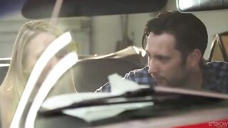 A couple has passionate sex right in the red convertible car