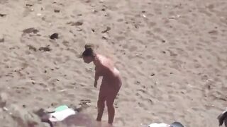 A couple enjoying each other without any clothes on the sea