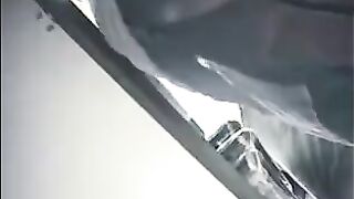 A secret camera at the checkout captures skirts of shoppers