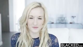 A blonde girl uses a vibrator while fucking a black guy
