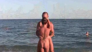 Naked beauties are showing their skills in acrobatics on the beach