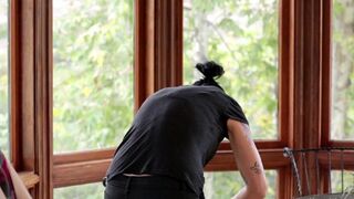 Vietnamese girl fucked in the kitchen with a strapon
