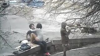 A guy was photographed during sex with a girl on the street