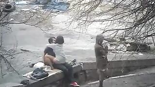 A guy was photographed during sex with a girl on the street