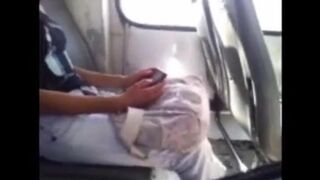 A handsome guy masturbates with his huge dick in front of a girl