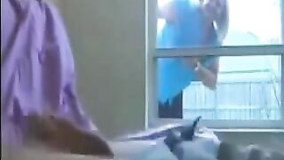 A woman peeps at a guy masturbating in his ward and helps him