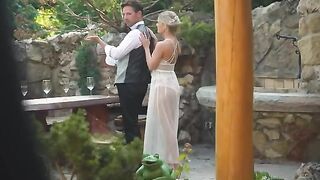 A pair is having fun on their honeymoon