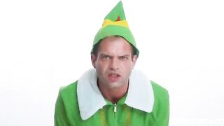 The holiday mood is set by an elf costume