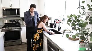 The babysitter got a little too close to dad in the kitchen