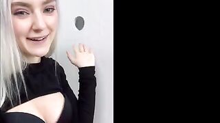 The cute girl received a huge cumshot through the glory hole in the fitting room