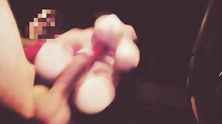 A girl with a silicone pussy fucks a guy in the car, showcasing intense passion