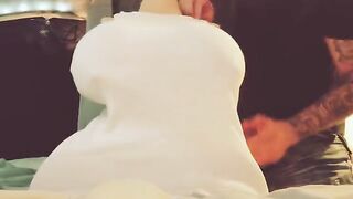 A man caresses his girlfriend’s breasts until he finishes