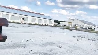 The slut is having fun in a unusual place with a big gun